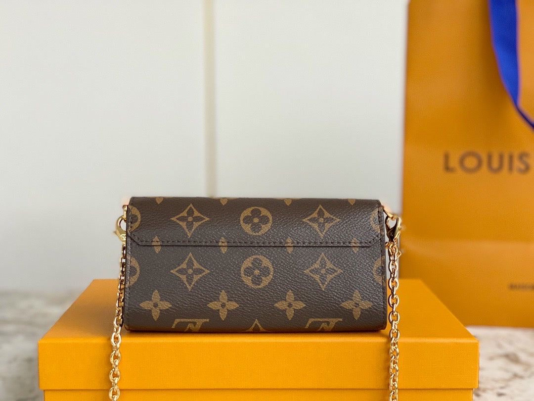 LV Bitsy Mini Pouch Leather with Brand Box