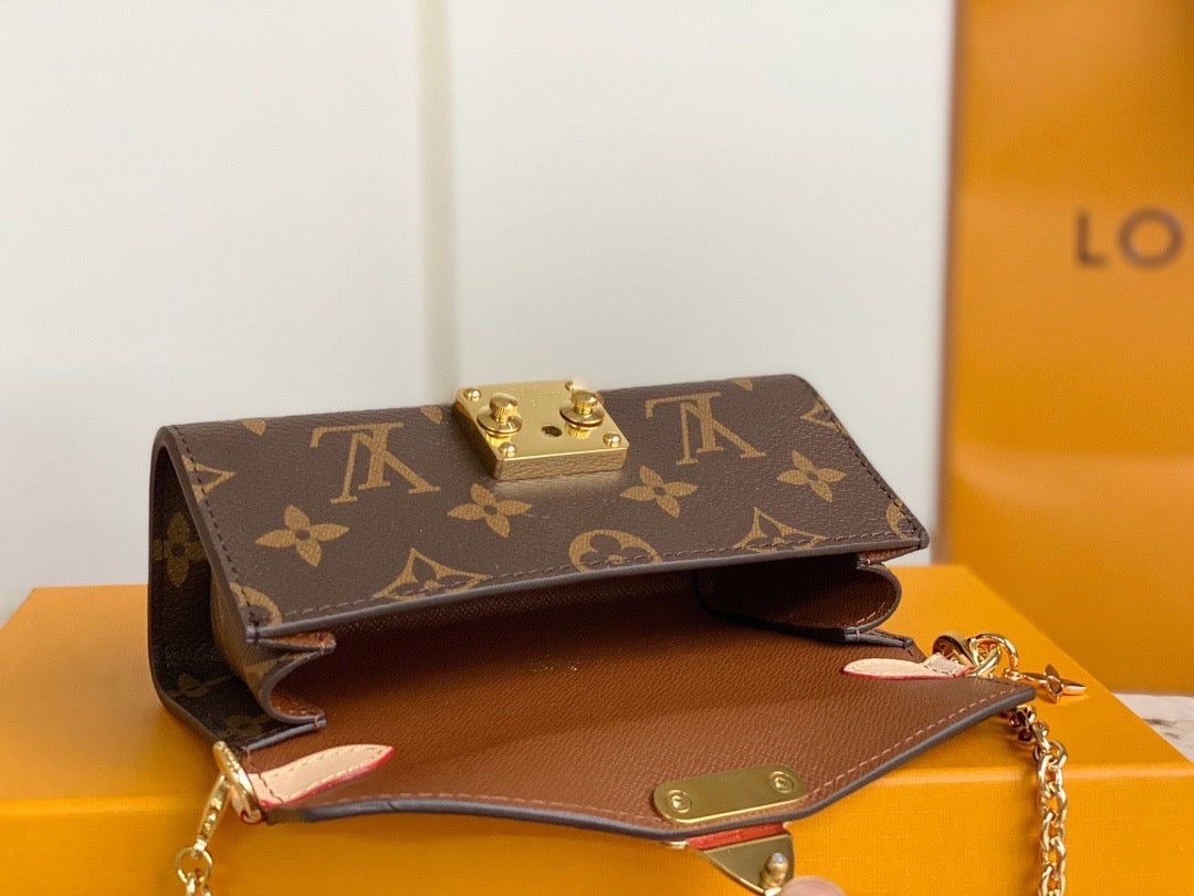 LV Bitsy Mini Pouch Leather with Brand Box