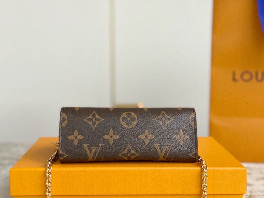 LV Bitsy Mini Pouch Leather with Brand Box