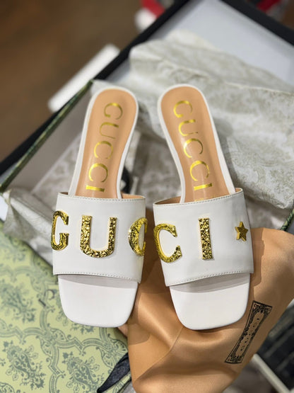 Gucci Cara Leather Slides